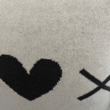 Gray fabric with black heart and cross symbols